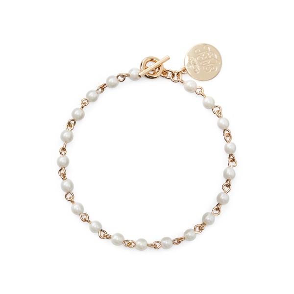 Bracciale dorato flessibile con perle
