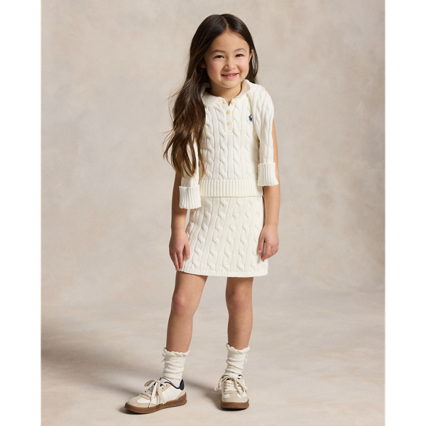 Polo-Pullover und Rock in Wickeloptik