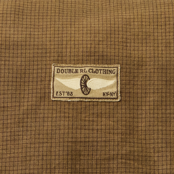 Leather-Trim Oilcloth Backpack