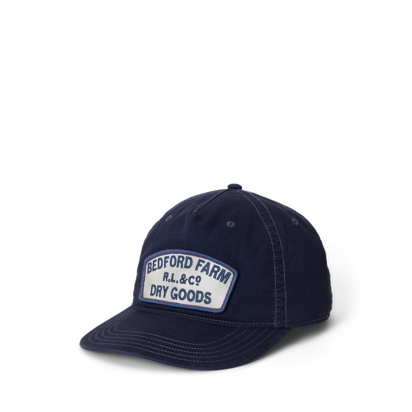 Fischgrat-Kappe mit gesticktem Aufnäher