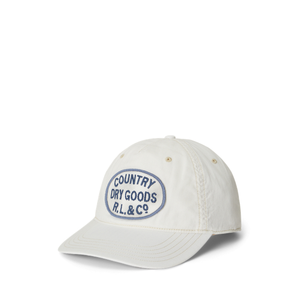 Fischgrat-Kappe mit gesticktem Aufnäher